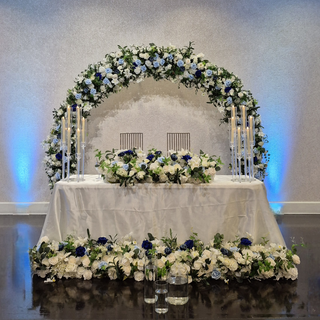 Florals & 2 Clear Candelabras 