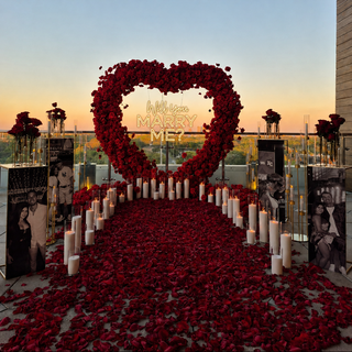 Arch, Neon Sign, 4 Runners, 36 Candles, 4 Candelabras, 4 photo-boards, 13K Natural Petals, 12 Vases with 48 Roses