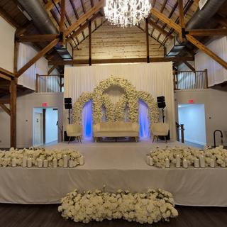 Triple Arch, 6 Runners,  24 Candles, Sofa, 2 Chairs, 2 uplights,  Drapes