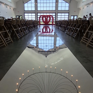 Silver Mirror Aisle And Red Triple Arch